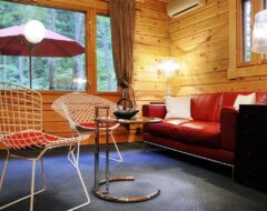 Deluxe Log Cottage 1 lounge, 2 bedrooms, Jet bath
